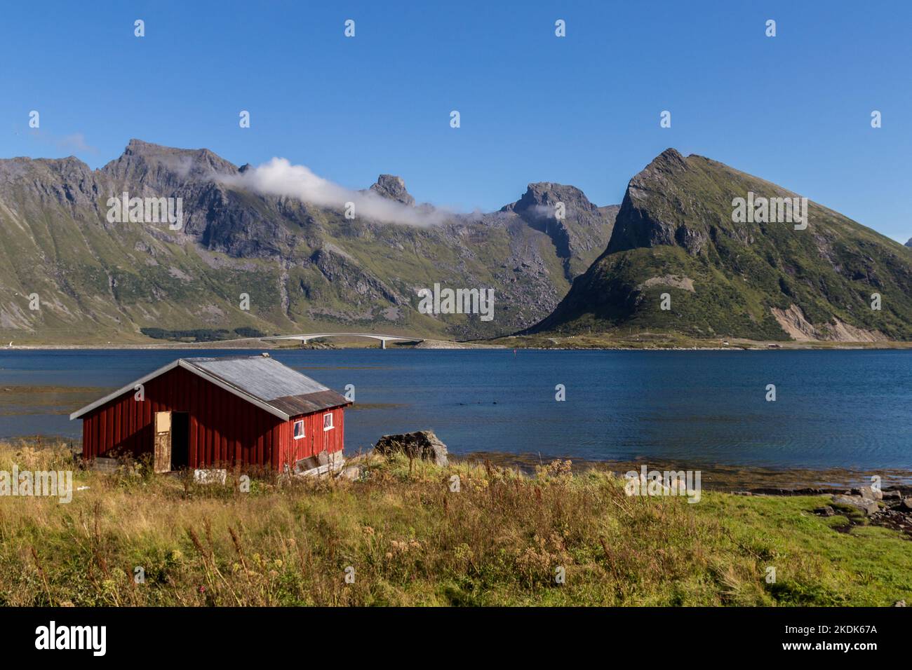 red wooden fisher stilt house at fjord in lofoten island norway europe