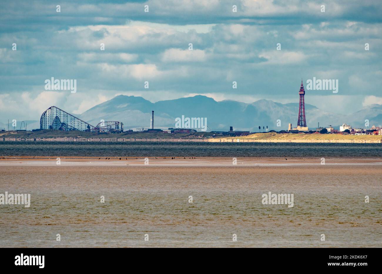 A view of Blackpool from Southport with the Lake District fells, Lancashire, UK Stock Photo