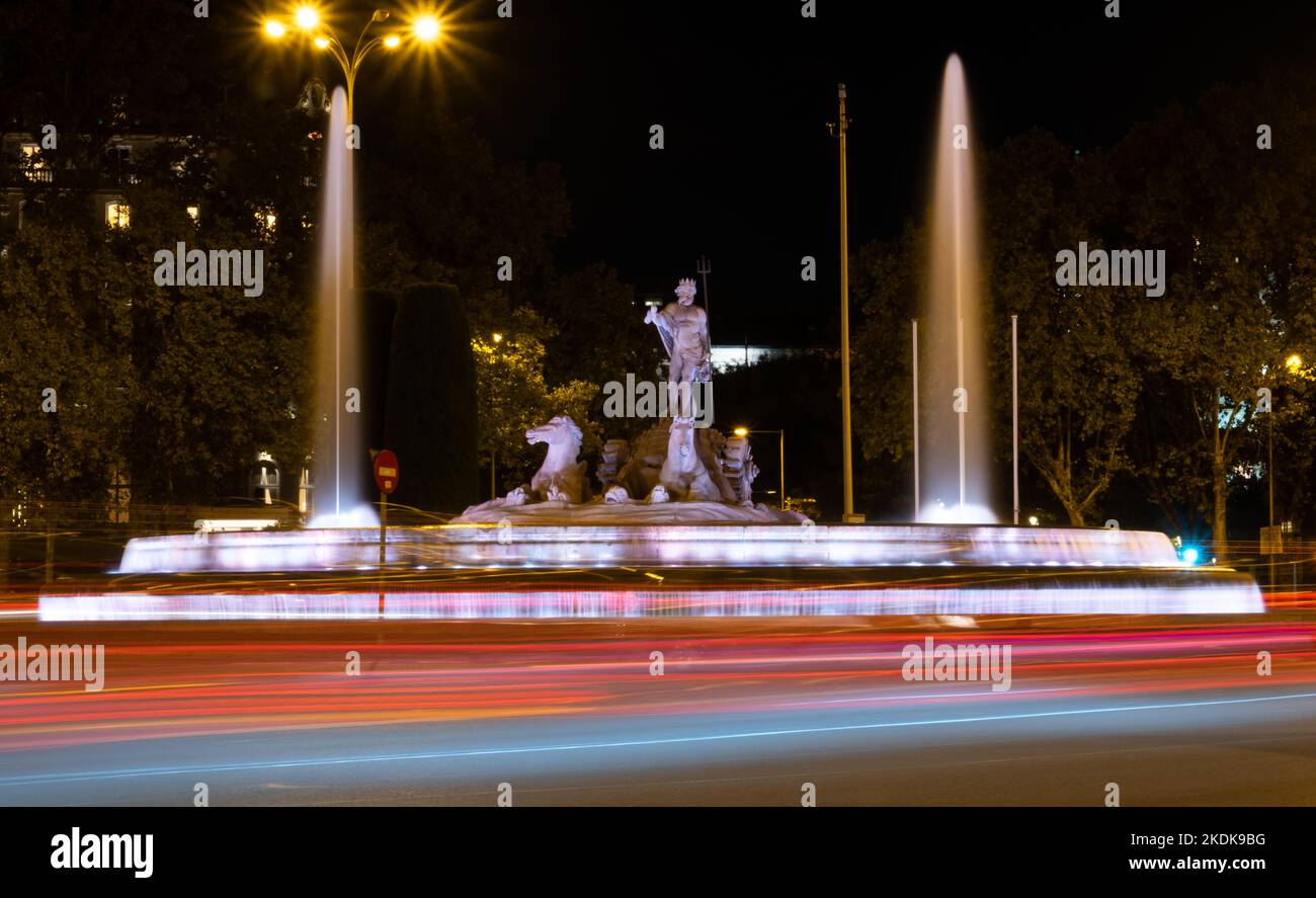 Madrid, Spain November 06 2022 Night shot of the Fountain of Neptune at square Canovas del Castillo Stock Photo