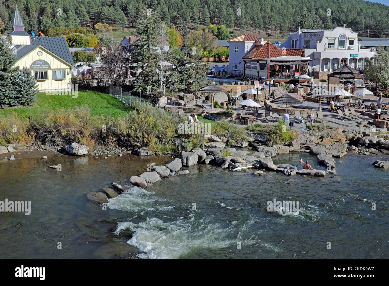 An overview of The Springs Resort and its neighboring Pagosa Springs Area Visitor Center along the San Juan River in Pagosa Springs, Colorado, USA. Stock Photo