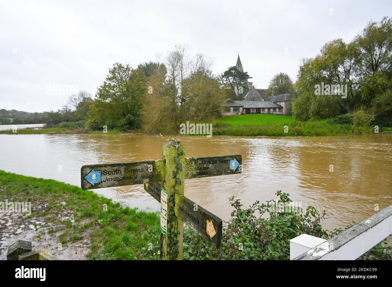 Alfriston East Sussex UK 7th November 2022 - The flooded Cuckmere River in Alfriston , East Sussex after heavy rain with more forecast to spread across Britain over the next few days : Credit Simon Dack / Alamy Live News Stock Photo