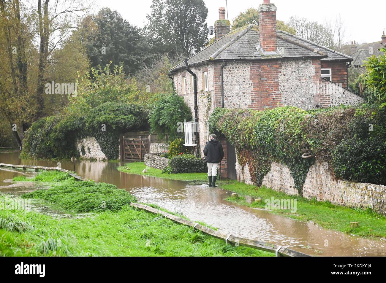 Alfriston East Sussex UK 7th November 2022 - Floodwater from the Cuckmere River close to cottages in Alfriston village in East Sussex after more heavy rain which  is forecast to continue across Britain over the next few days : Credit Simon Dack / Alamy Live News Stock Photo