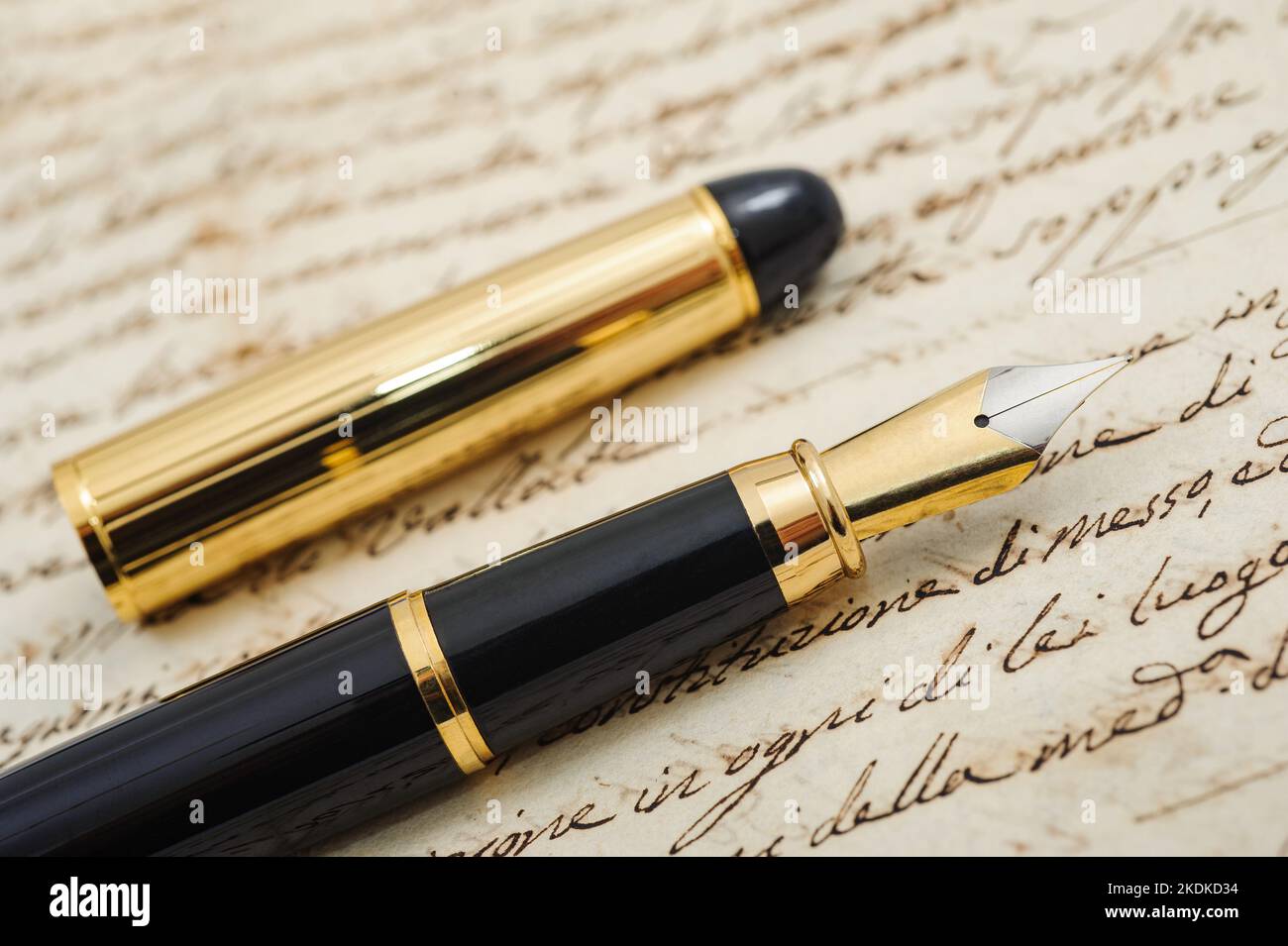 Fountain pen with cap on an antique letter Stock Photo Alamy