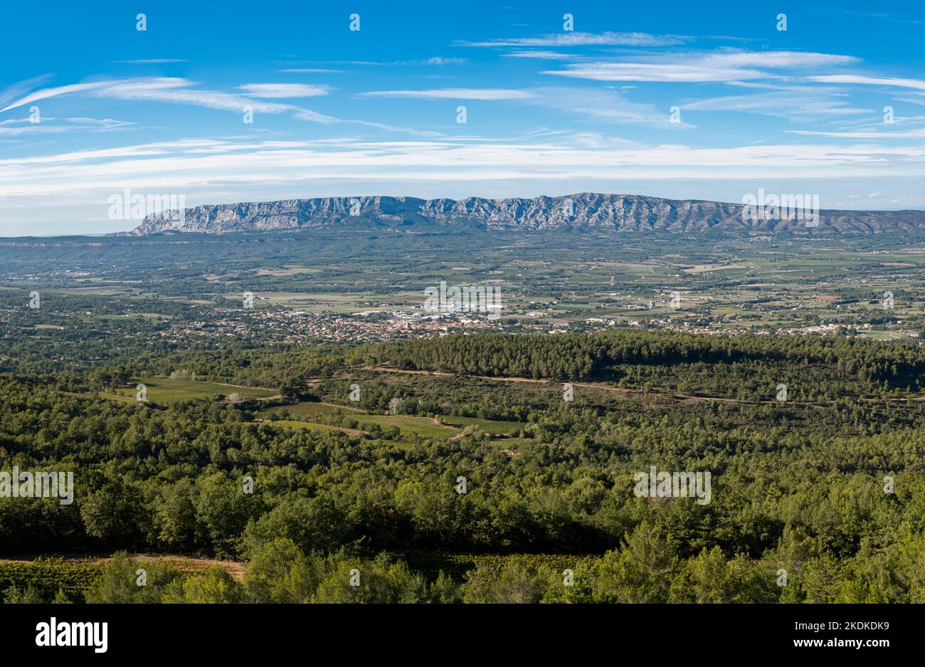 Horizontal panoramic of the iconic Mont Sainte Victoire with a village and woods, Provence, South of France Stock Photo