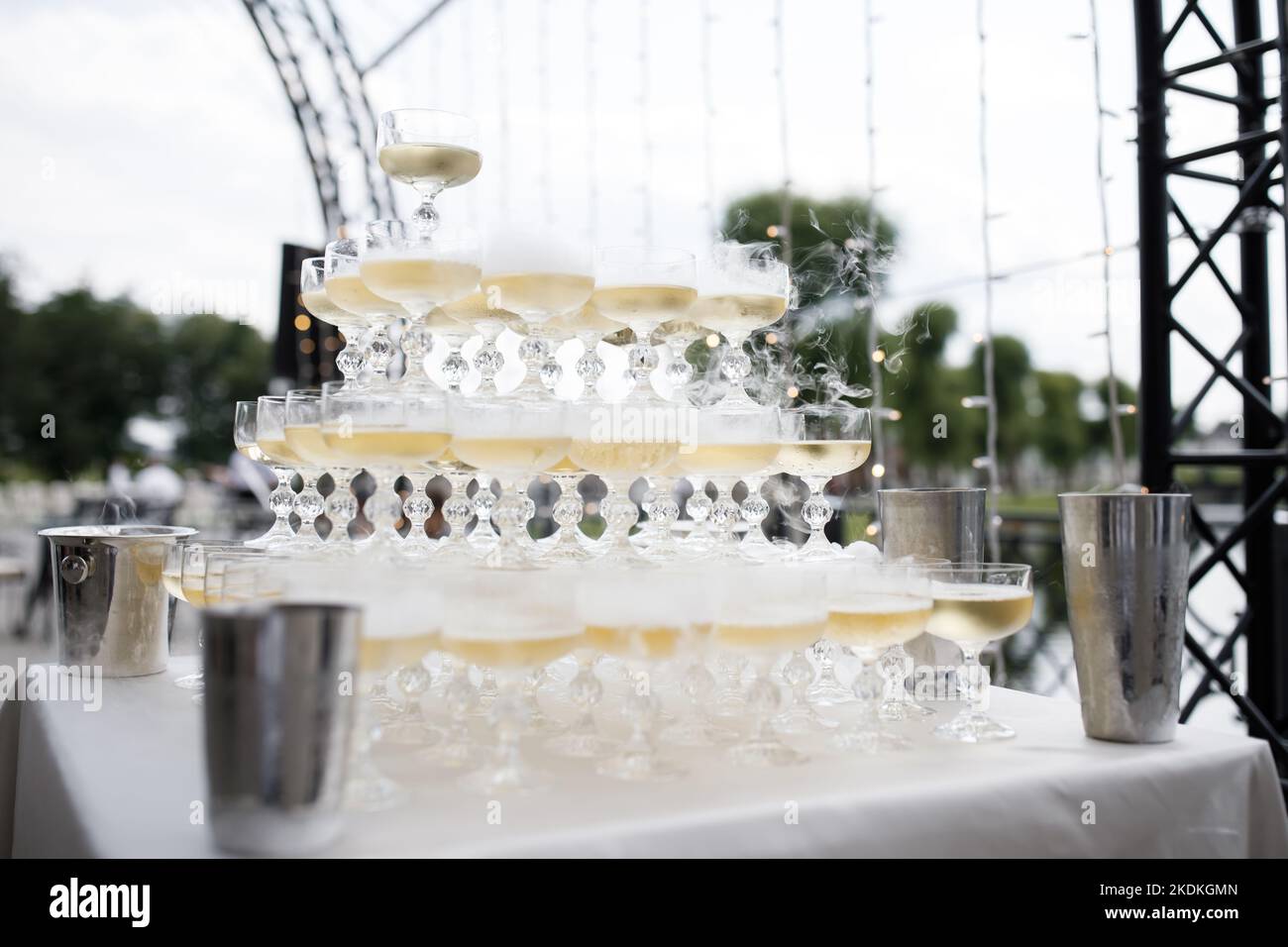 Champagne glass pyramid. Pyramid of glasses of wine, champagne, tower of champagne's glass in