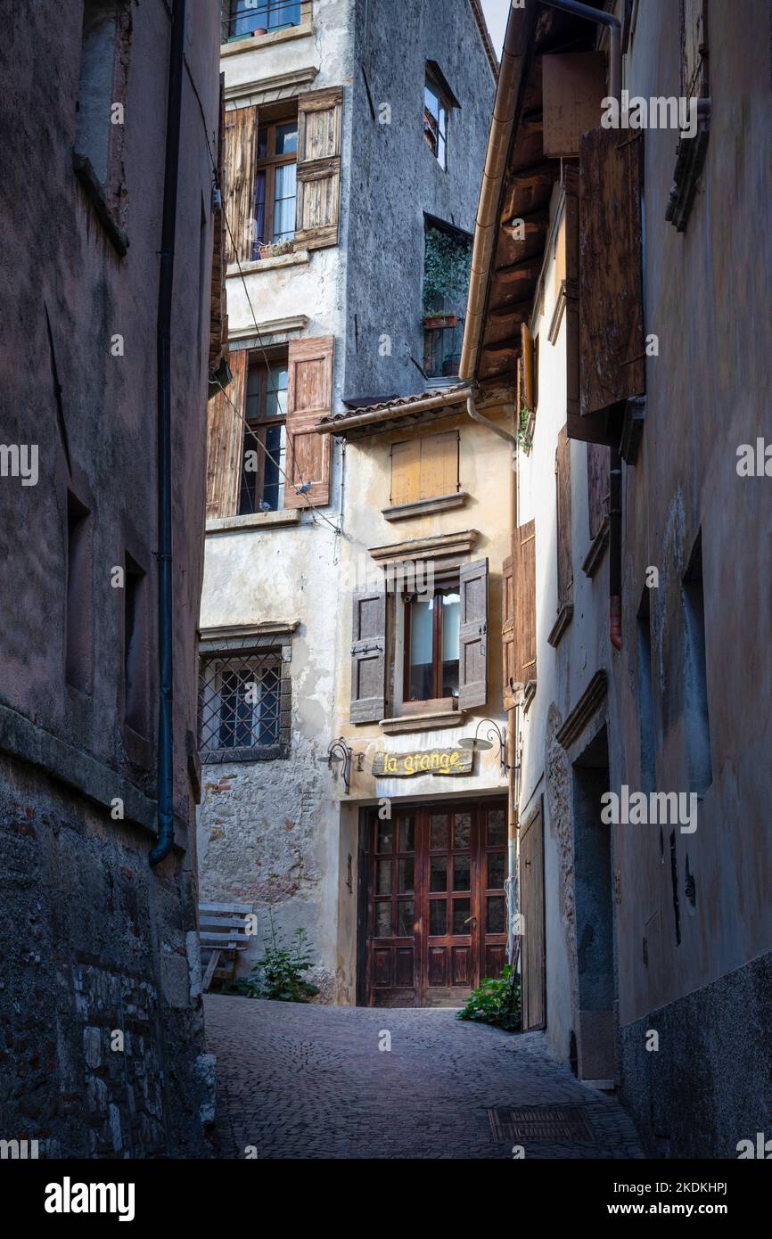 A side street leads to a small cafe in Asolo, Italy. Stock Photo