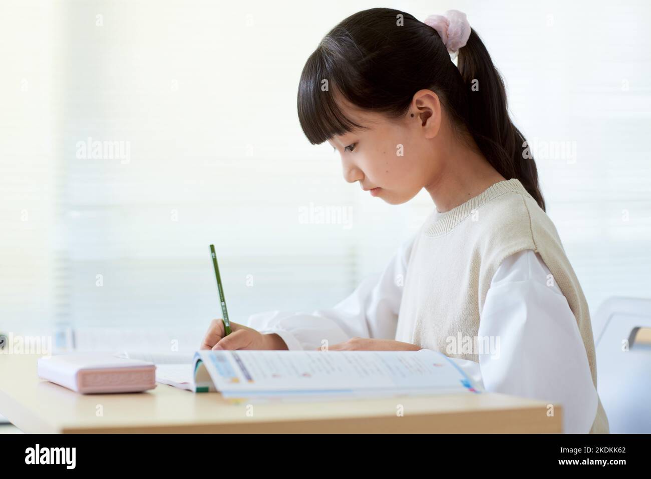 Japanese kid studying Stock Photo