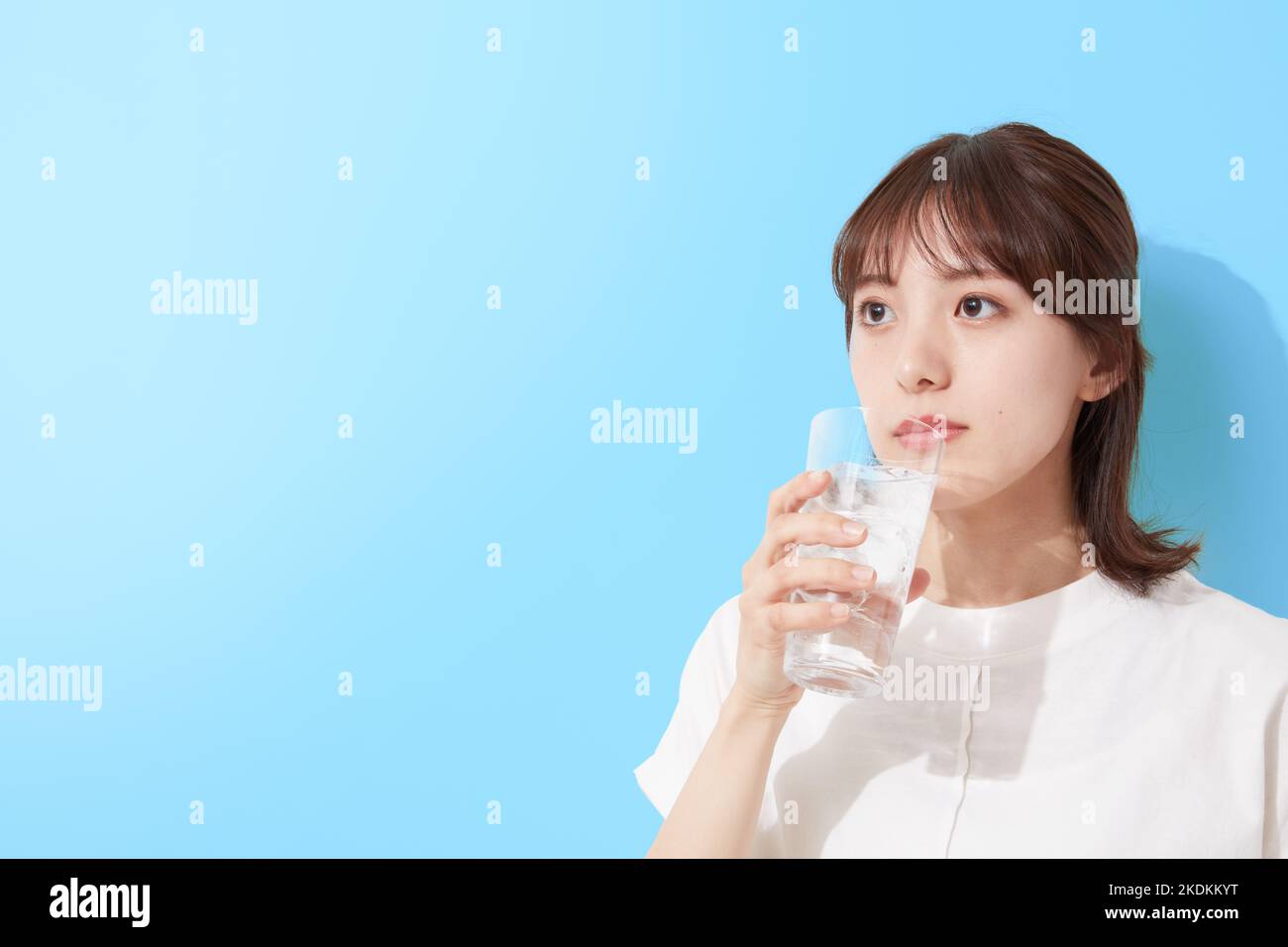 Young Japanese woman drinking water Stock Photo Alamy