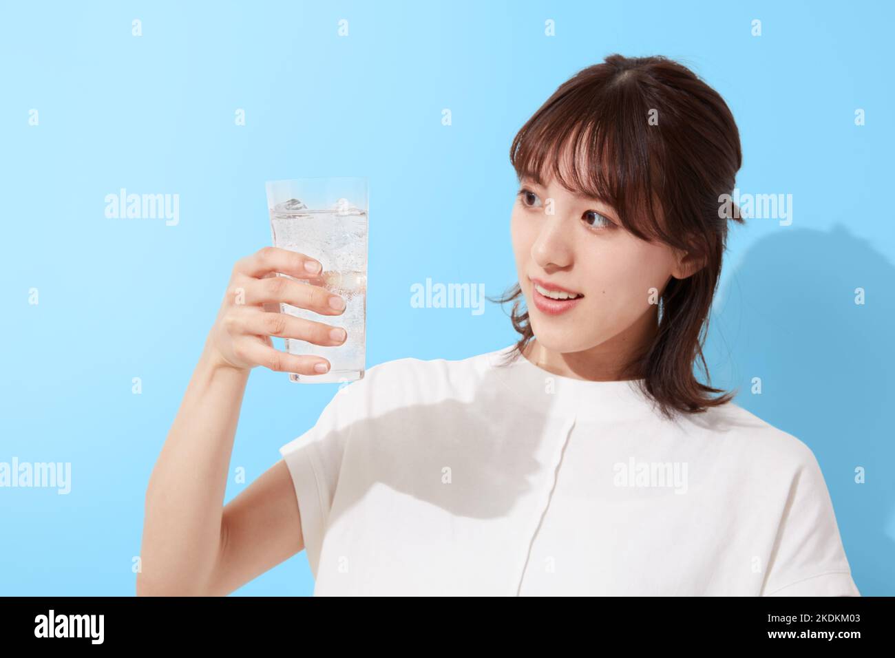 Young Japanese woman drinking water Stock Photo Alamy