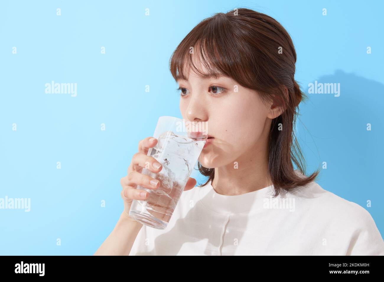 Young Japanese woman drinking water Stock Photo Alamy
