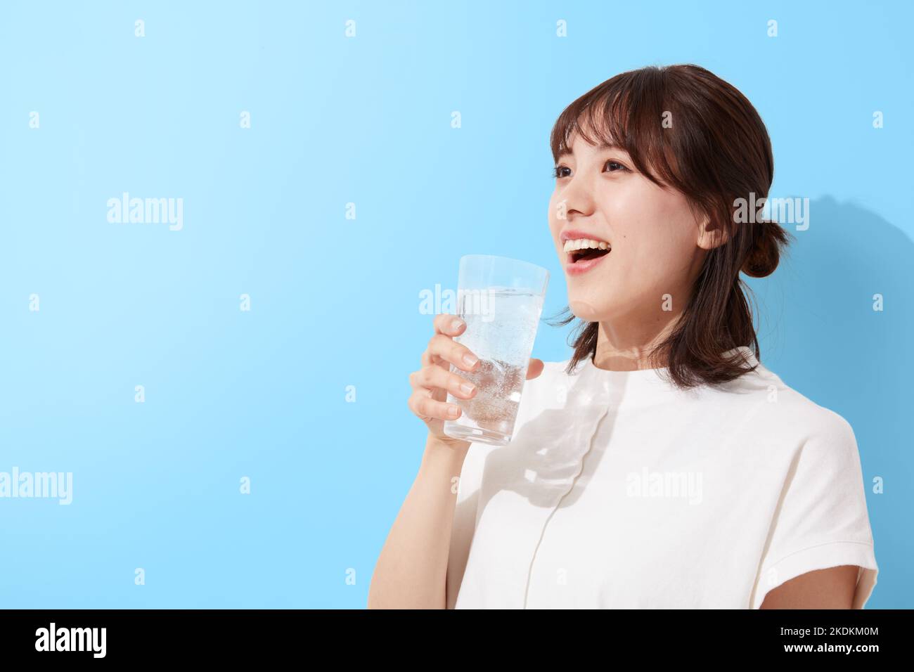 Young Japanese woman drinking water Stock Photo Alamy