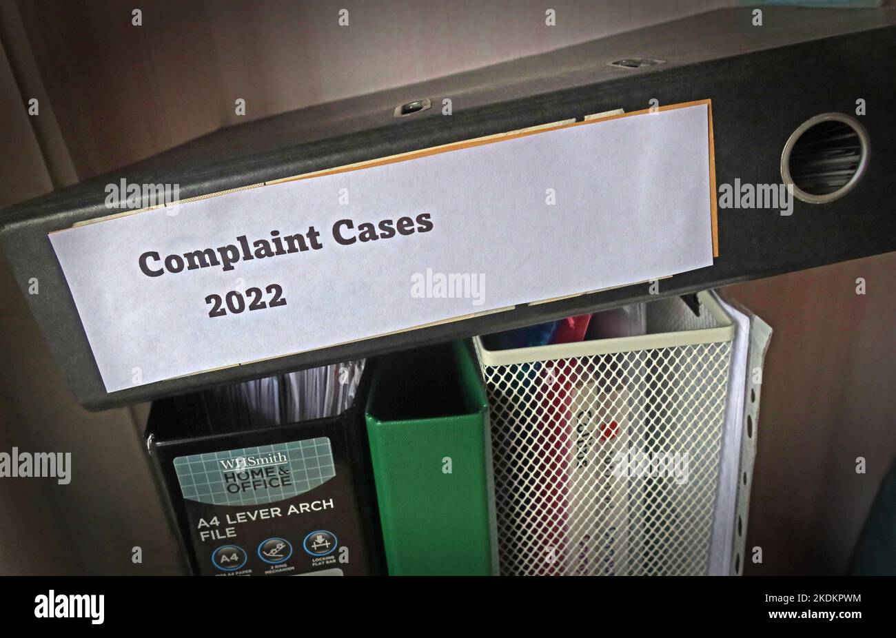 Complaint Cases 2022 lever arch file, containing separate issues and cases, in an office environment Stock Photo