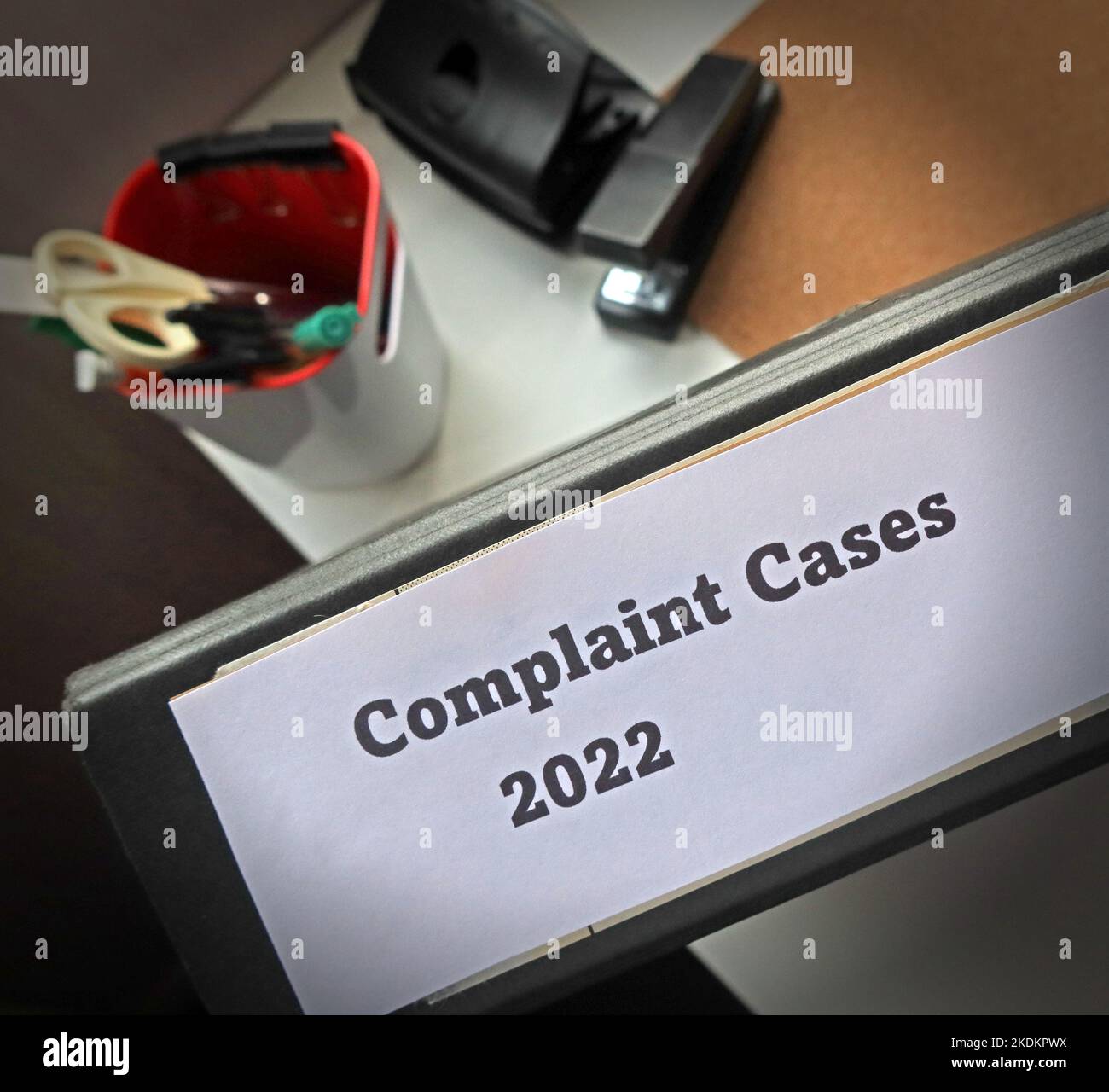 Complaint Cases 2022 lever arch file, containing separate issues and cases, in an office environment Stock Photo