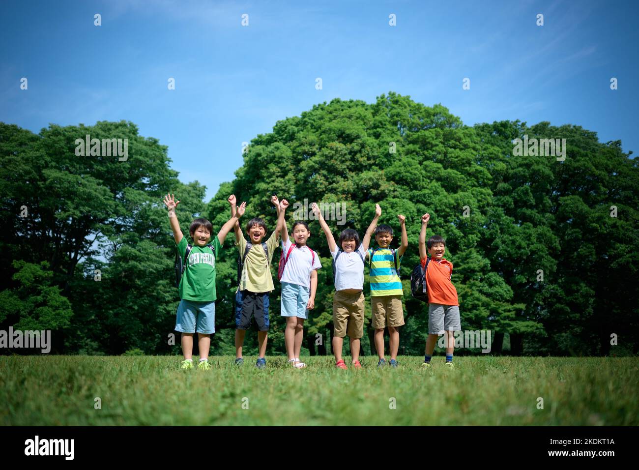 Japanese kids at city park Stock Photo