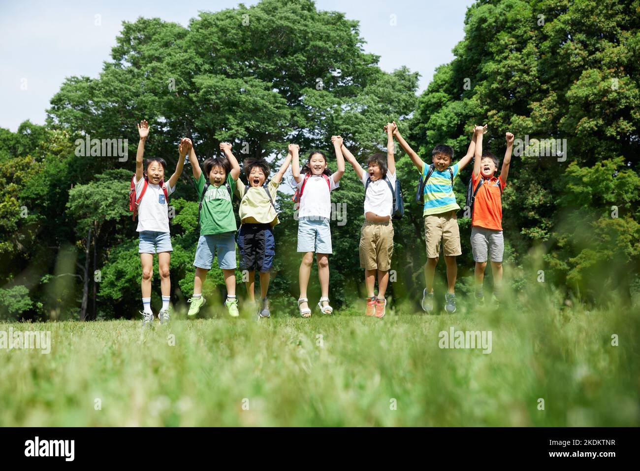 Japanese kids at city park Stock Photo