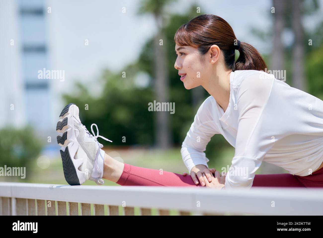 Young Japanese training downtown Stock Photo