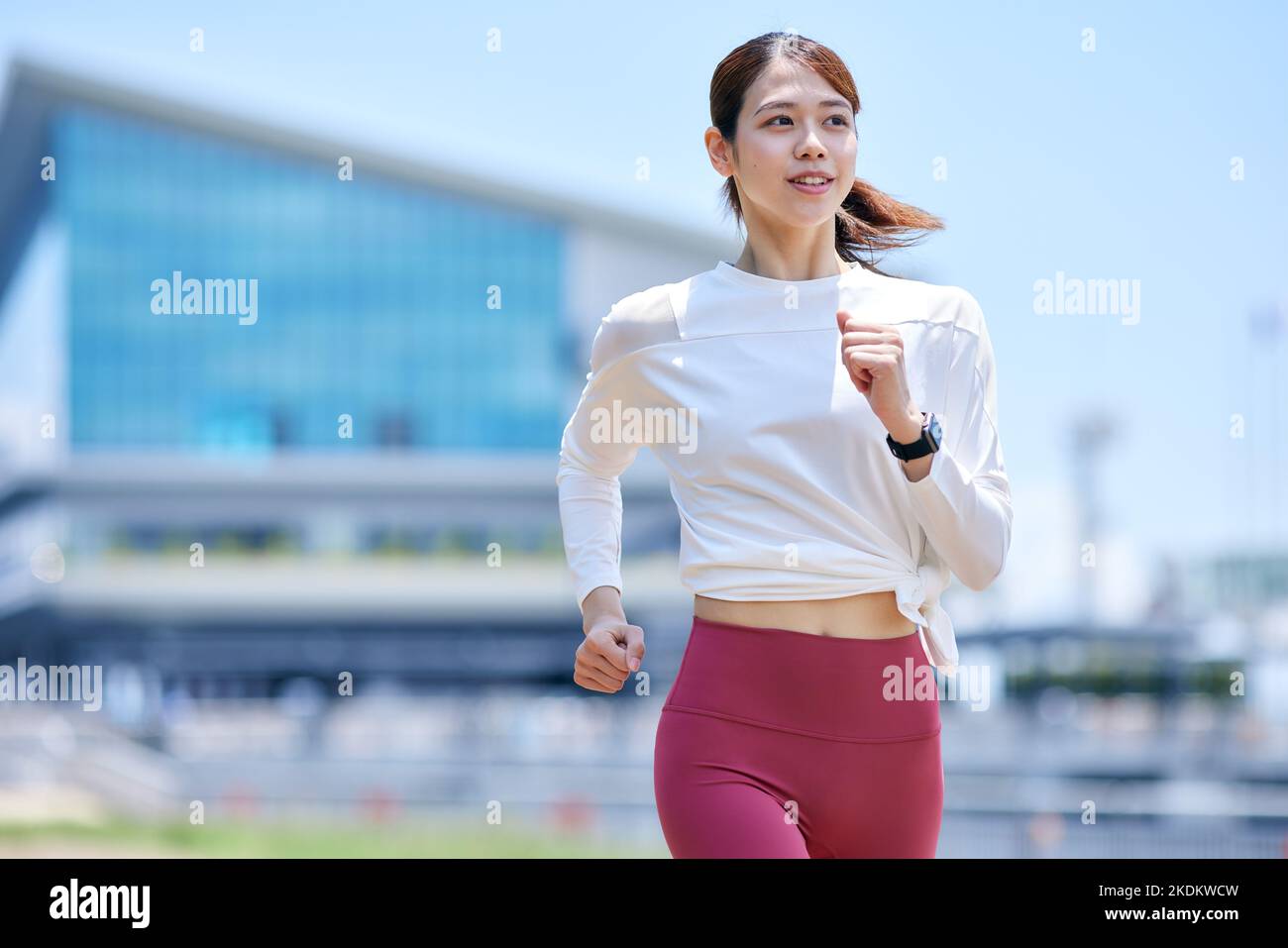 Young Japanese training downtown Stock Photo