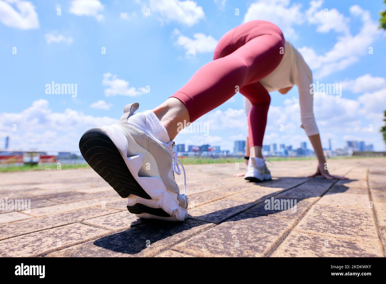 Young Japanese training downtown Stock Photo
