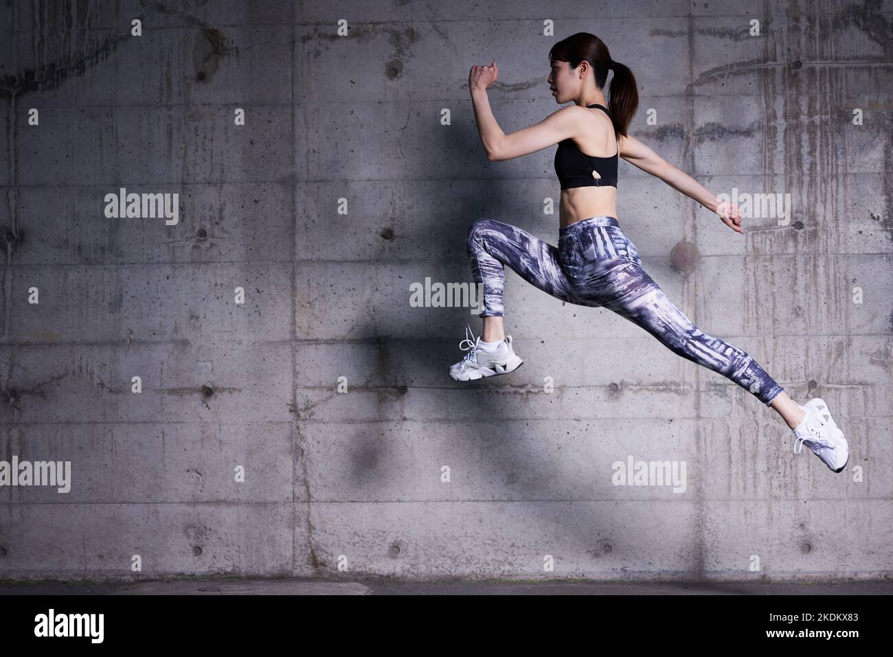 Young Japanese training downtown Stock Photo