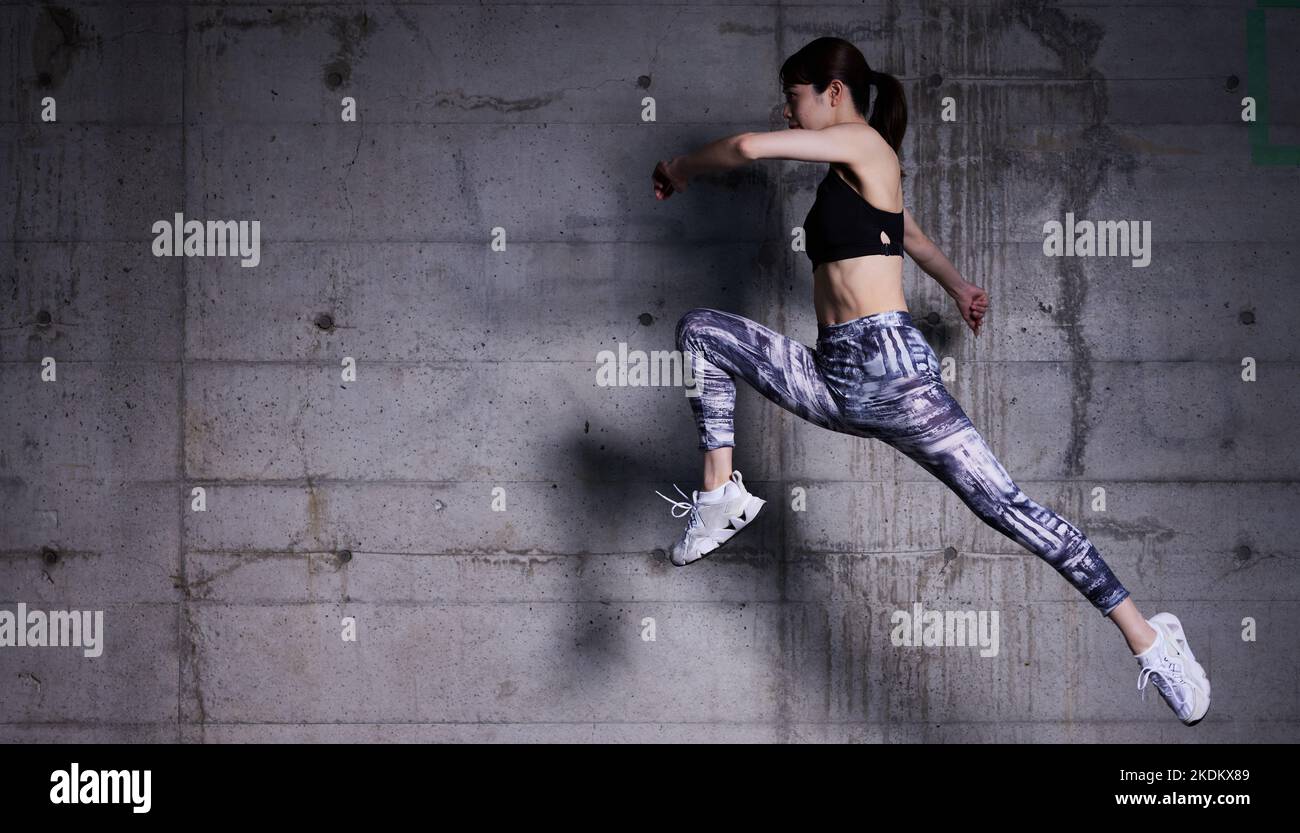 Young Japanese training downtown Stock Photo