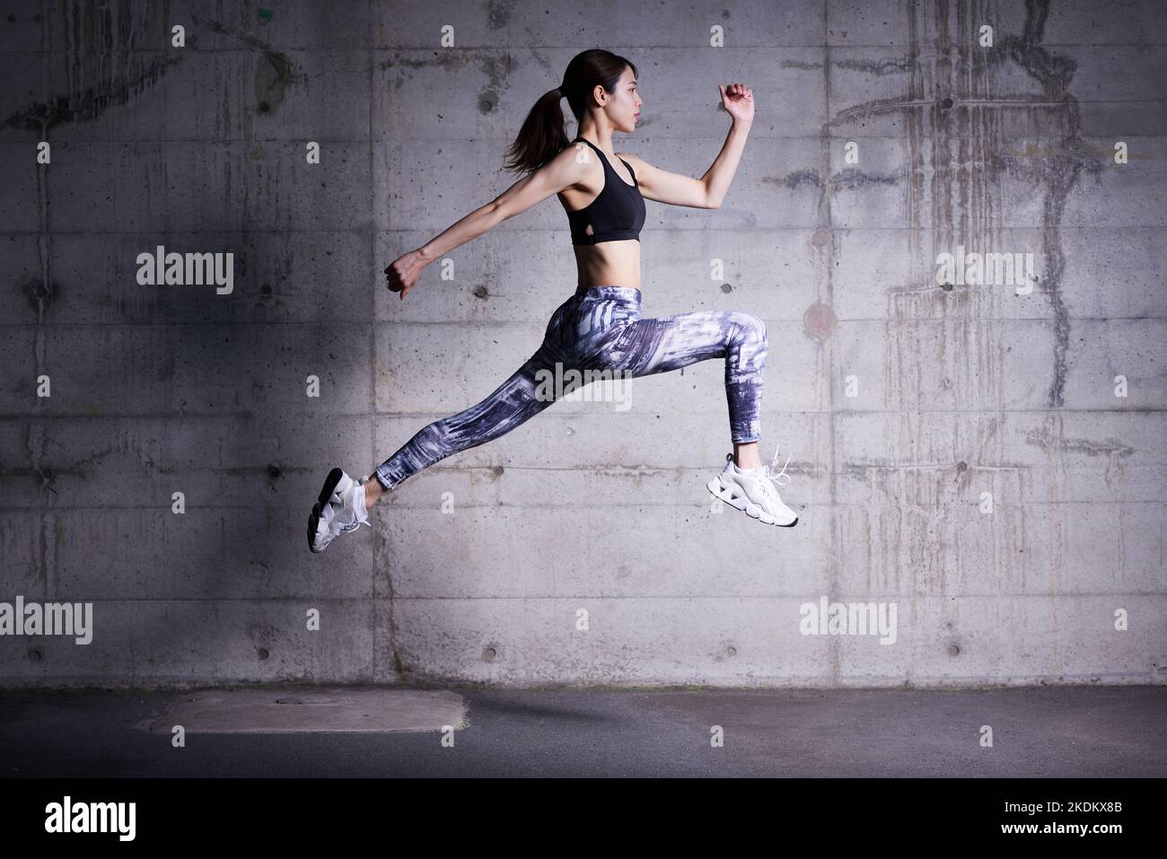 Young Japanese training downtown Stock Photo