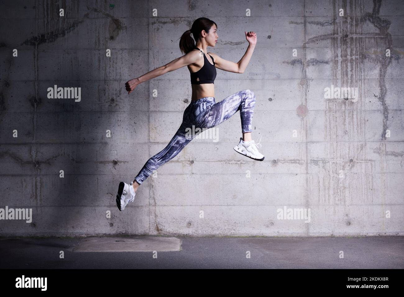 Young Japanese training downtown Stock Photo