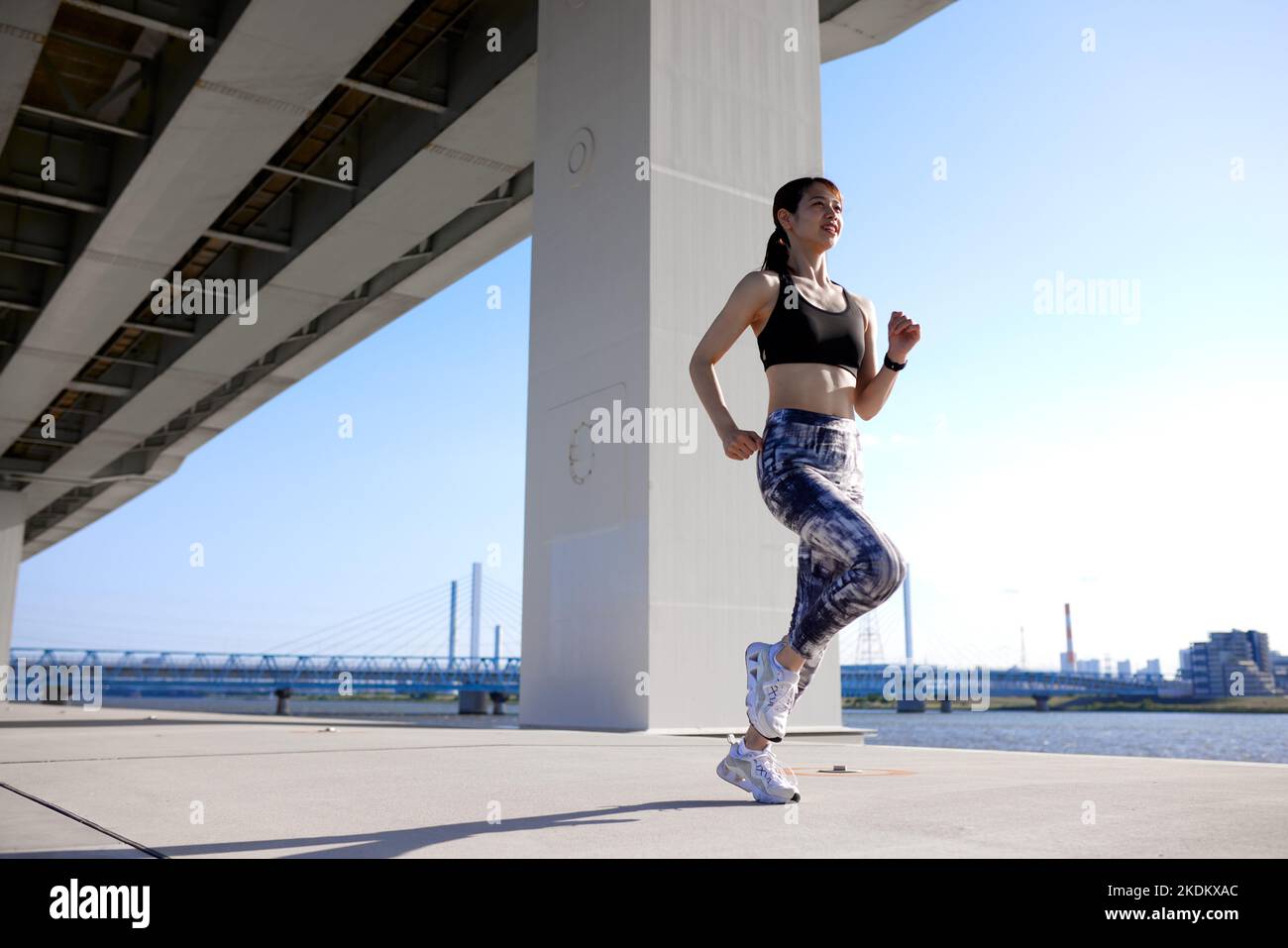 Young Japanese training downtown Stock Photo