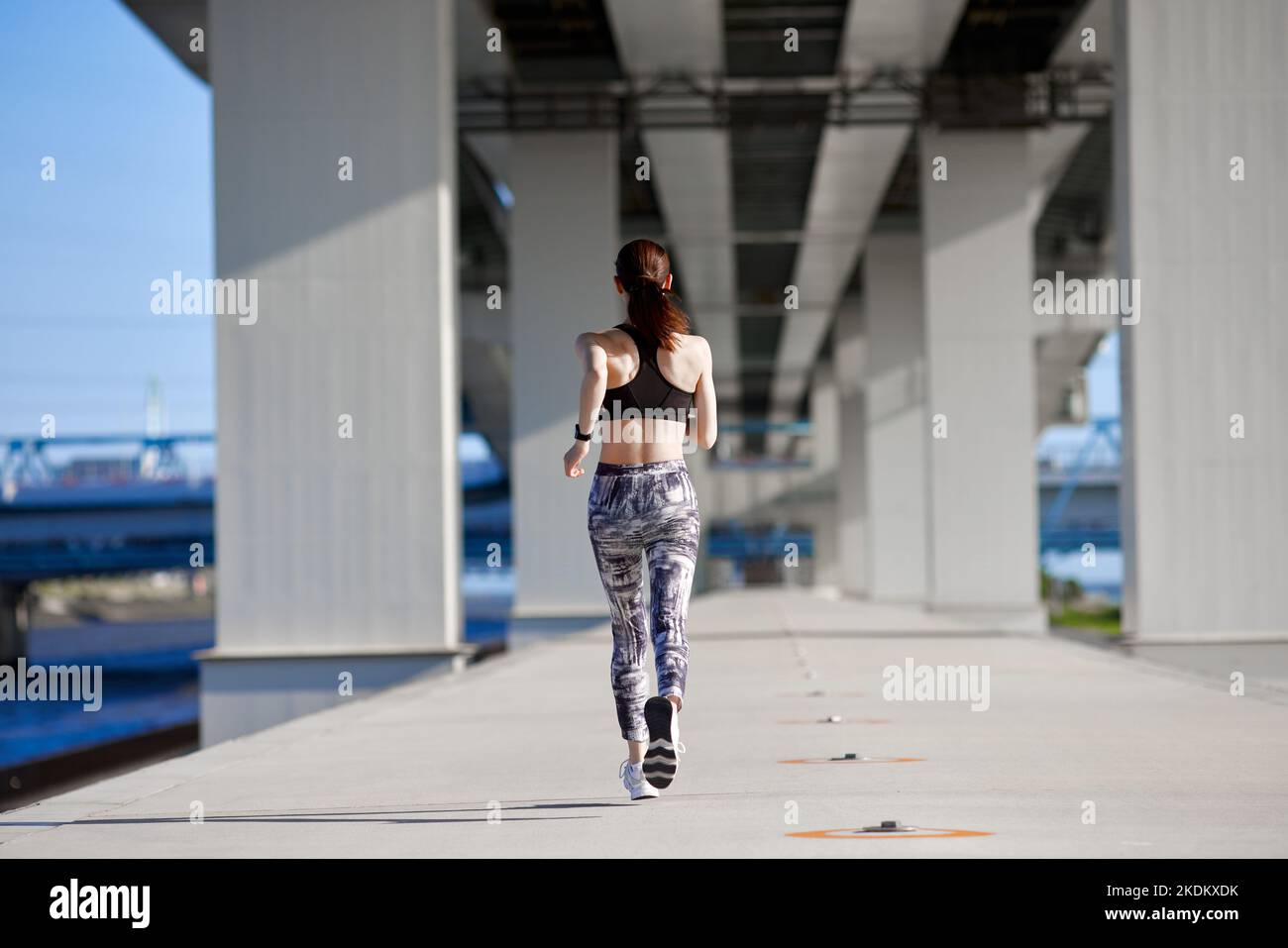 Young Japanese training downtown Stock Photo