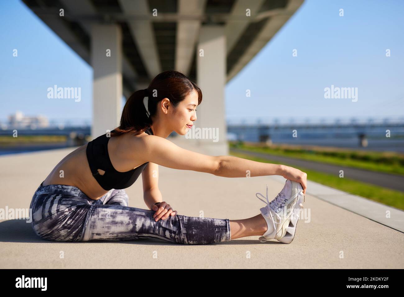 Young Japanese training downtown Stock Photo