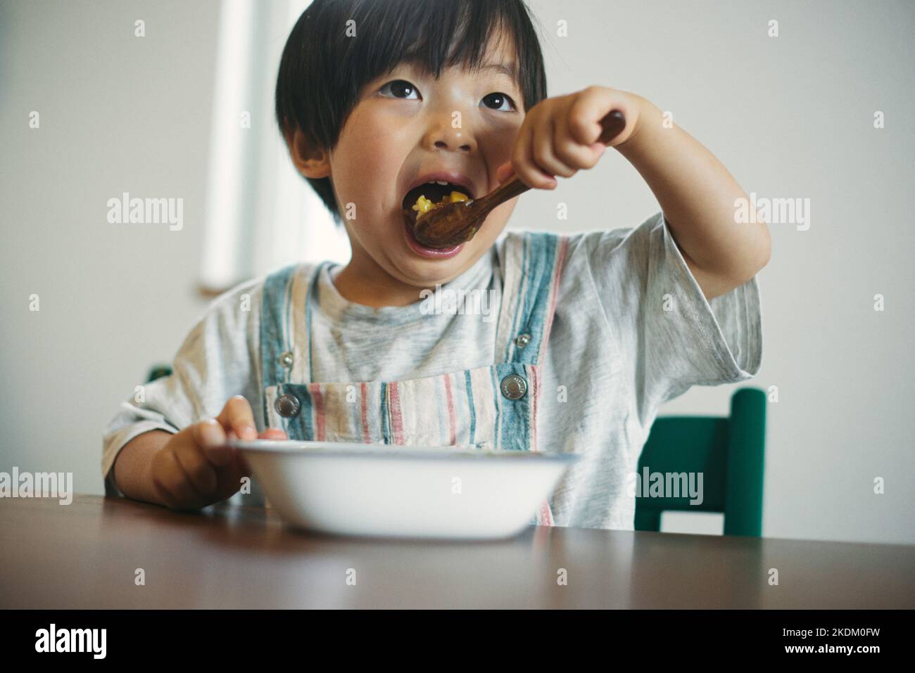 Japanese kid at eating at home Stock Photo Alamy