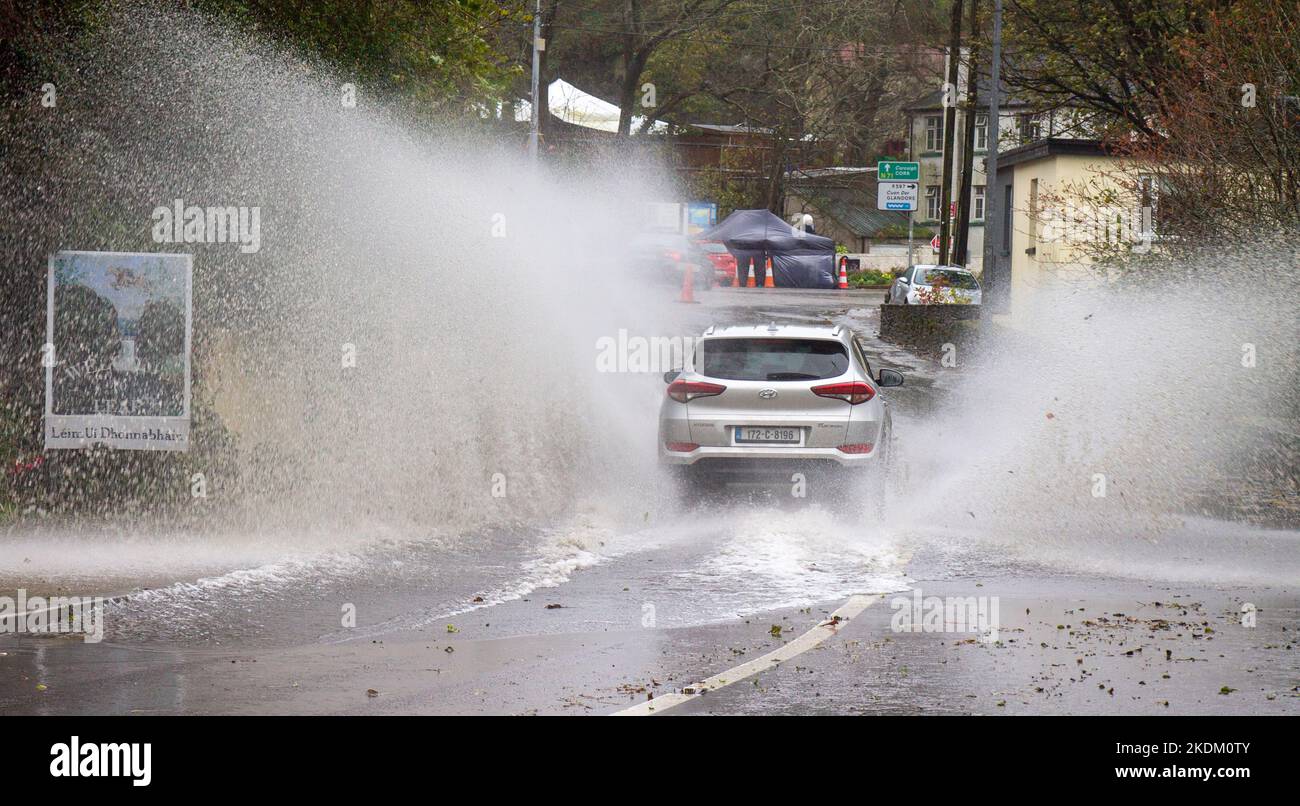 Cars or Vehicles driving through flooded roads, Leap, West Cork, Ireland Stock Photo