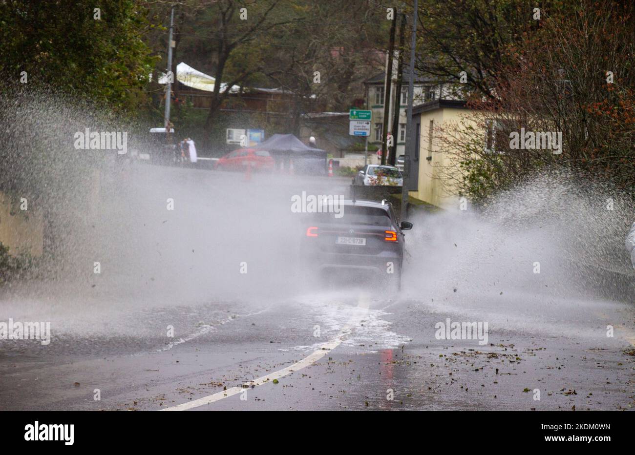 Cars or Vehicles driving through flooded roads, Leap, West Cork, Ireland Stock Photo
