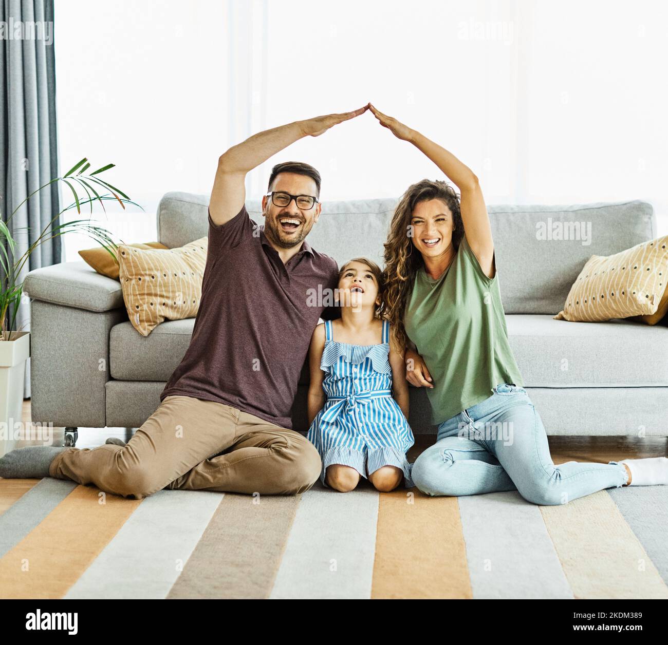 child family home father mother roof house together daughter woman man