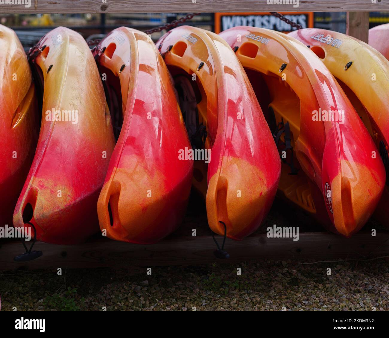 Bright red, orange and yellow kayaks, canoe.  Bold abstract image Stock Photo