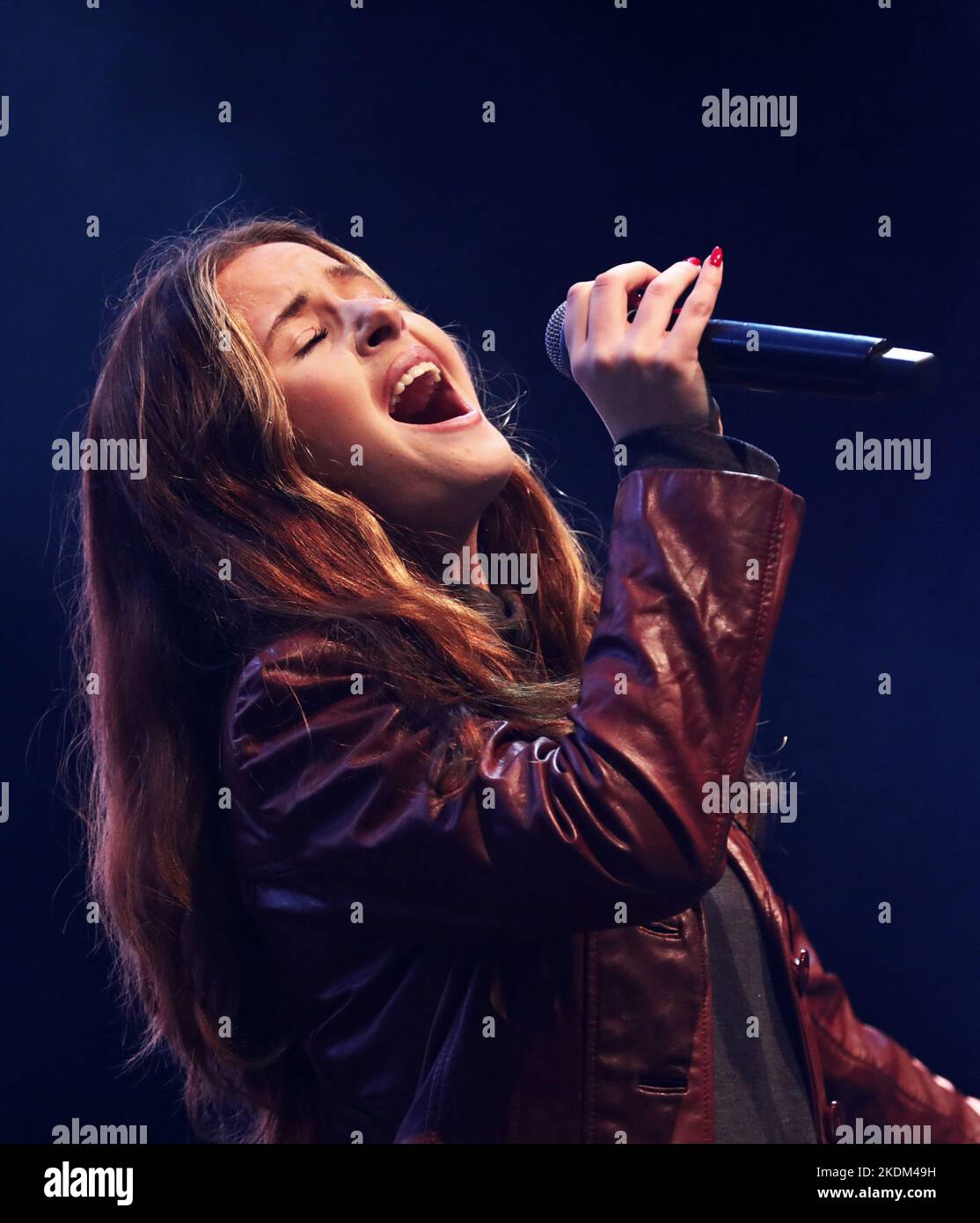In the picture: Unknown singer on stage during the celebration. Earlier 