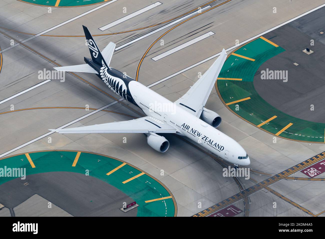 Air New Zealand / Air NZ Boeing 777 aircraft taxiing. Plane 777-300ER registered as ZK-OKP. Airplane of airline also know as Air NZ. Stock Photo
