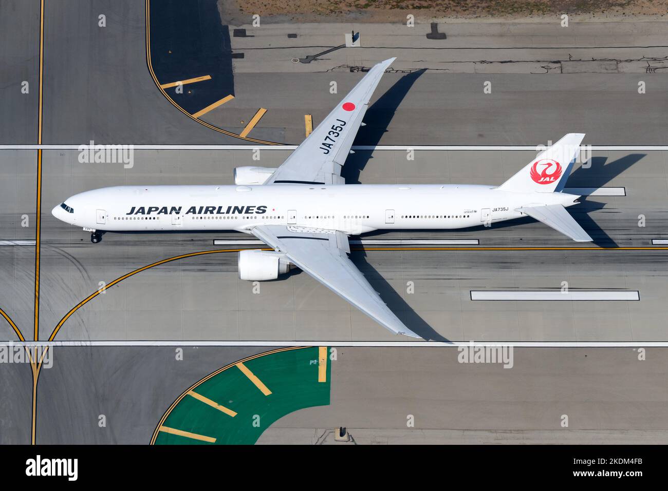 Japan Airlines Boeing 777 airplane taking off on runway. Aircraft 77W of Japan Airlines / JAL Airlines. JAL plane JA735J of 777-300ER model. Stock Photo