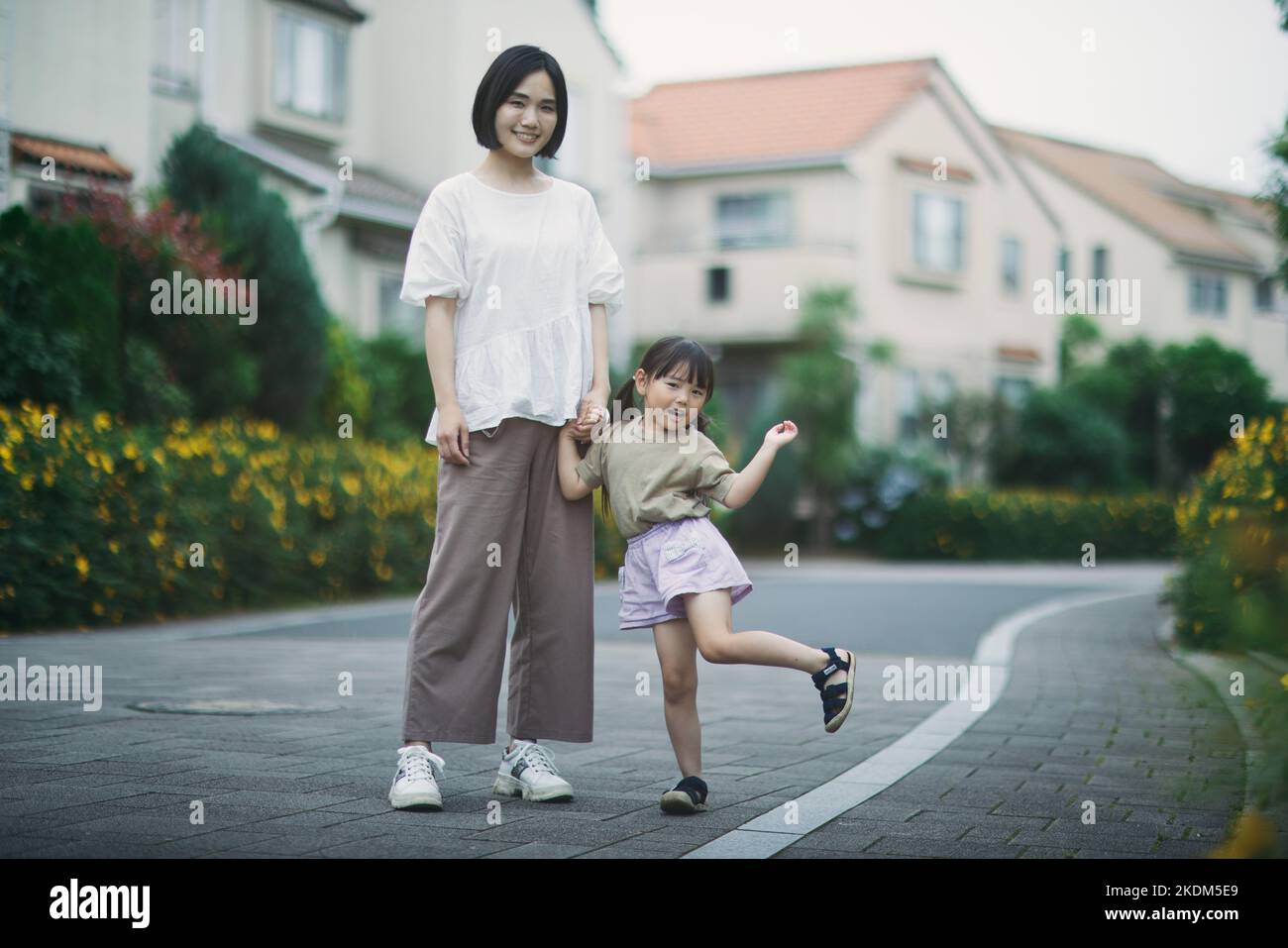 Japanese kid with her mother Stock Photo