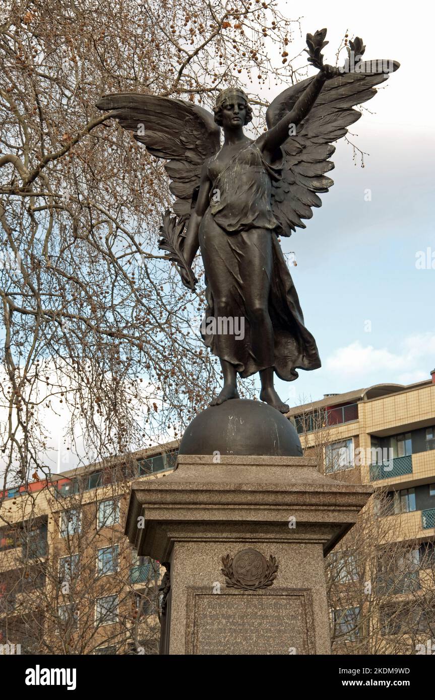 Finsbury War Memorial, Islington, London. WW1; WW2; The statue represents winged Victory on orb, lightly draped and holding a laurel wreath. Stock Photo