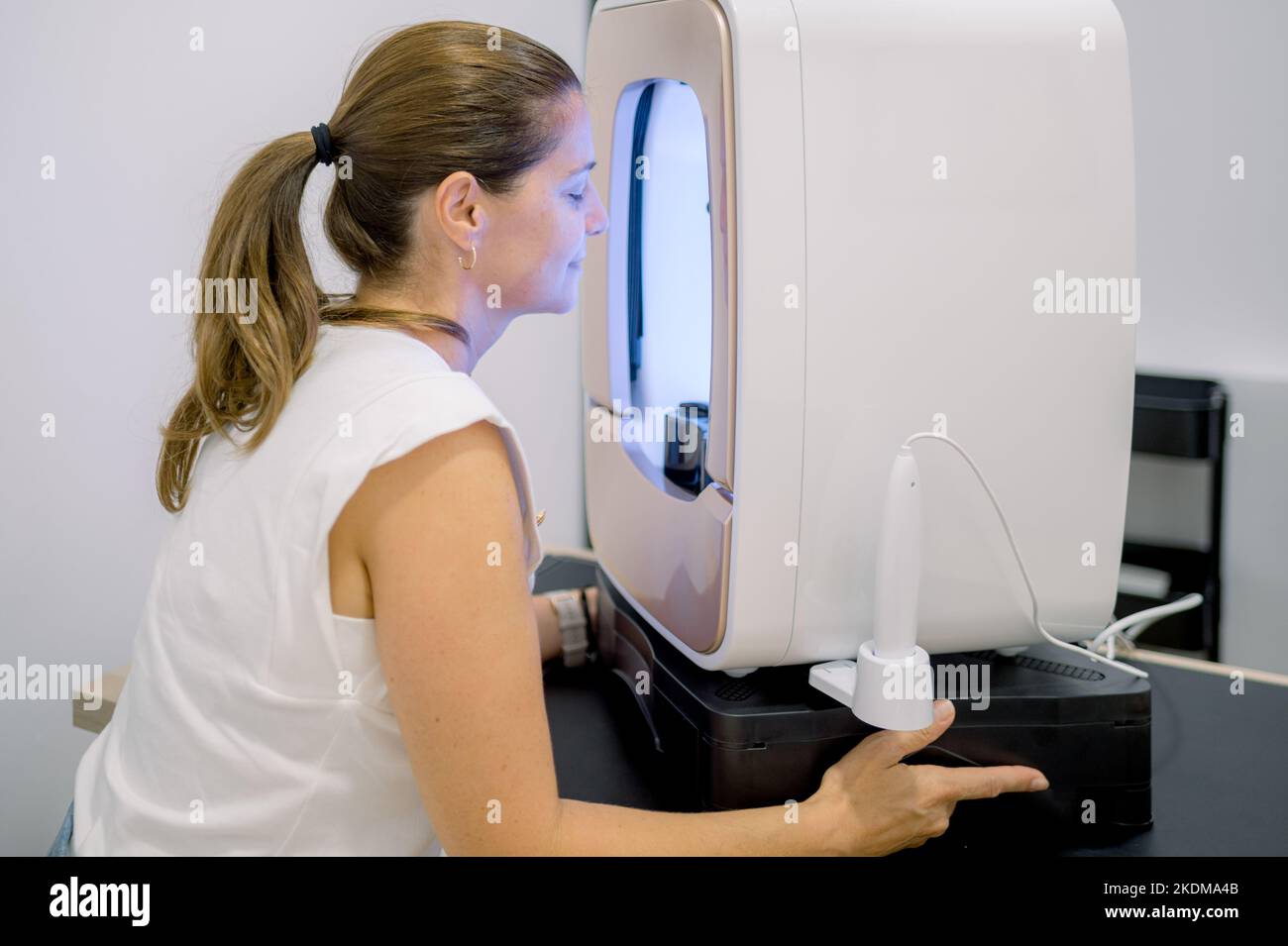 Man adjusting a wash and cure machine using UV light before use, for 3d  resin printer Stock Photo - Alamy