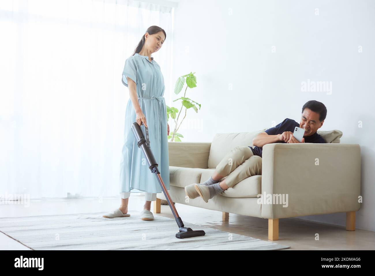 Japanese senior woman cleaning at home Stock Photo Alamy