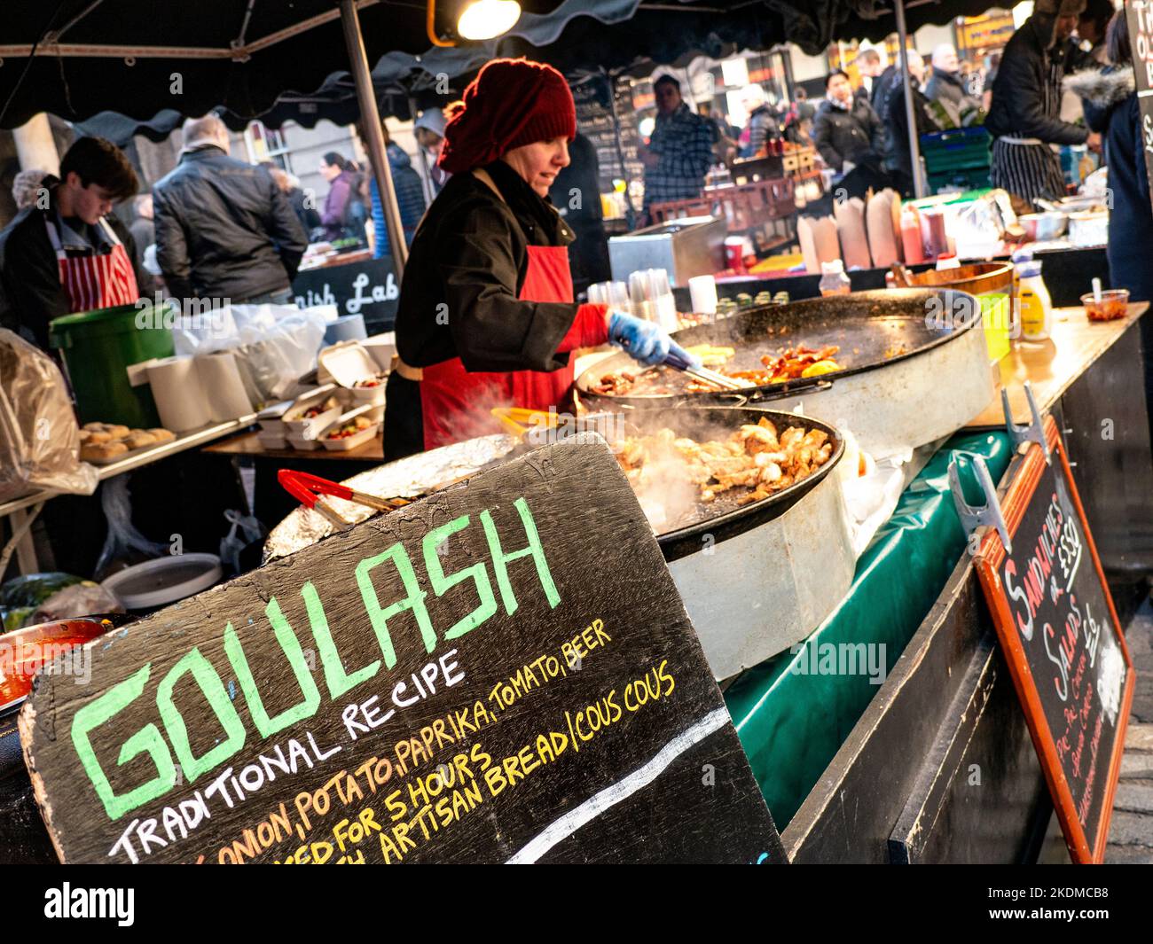 GOULASH WINTER MARKET STREET FOOD ALFRESCO DINING LONDON Hot fast food on sale at Covent Garden winter street food piazza market stall London UK Stock Photo