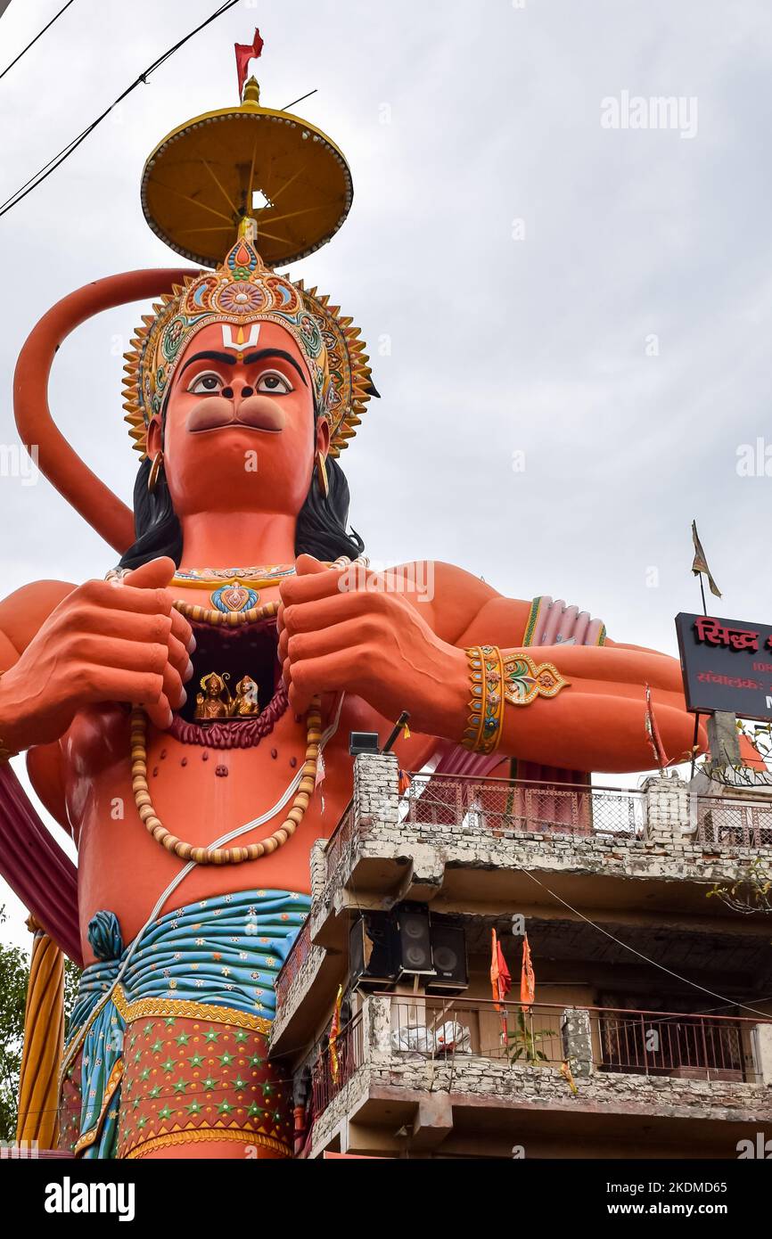Big statue of Lord Hanuman near the delhi metro bridge situated near