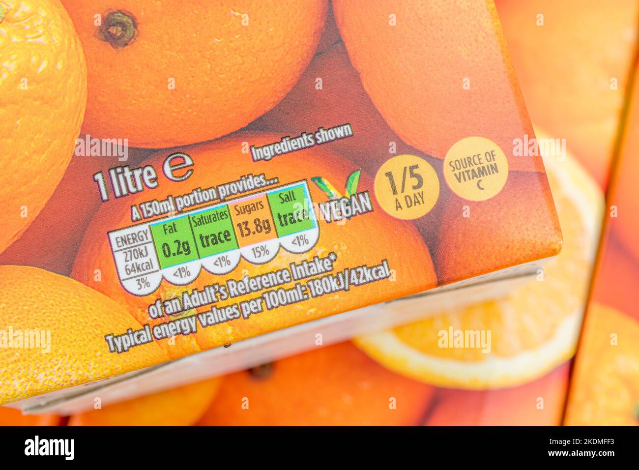 Morrison's orange juice cartons & labelling showing sugar