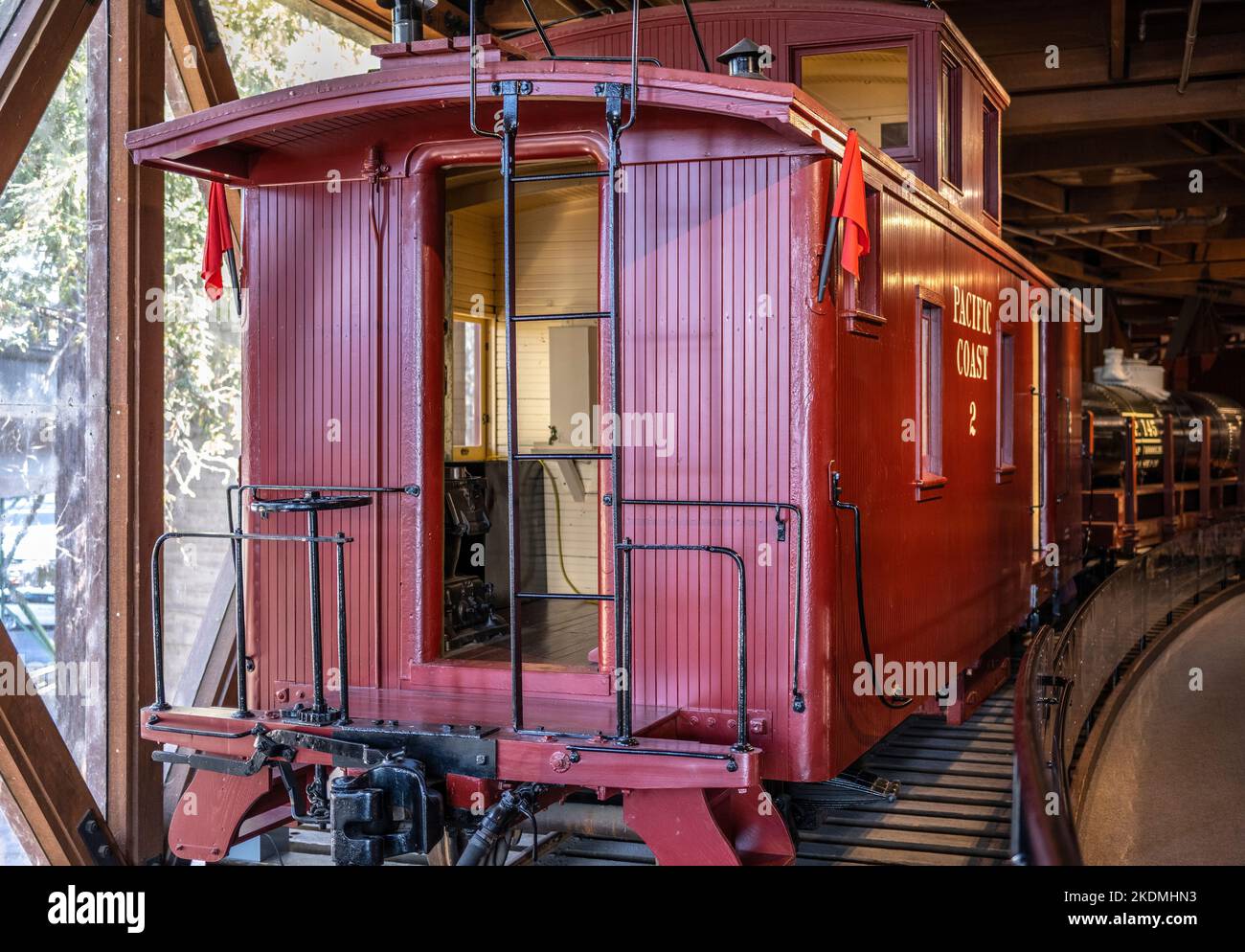 the red caboose was at the end of all American and Canadian freight cars to provide shelter to the crew that worked on the train doing the switching a Stock Photo