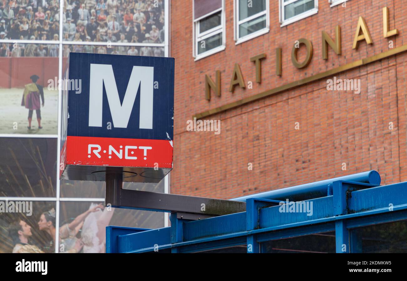 A picture of the Amsterdam subway sign in in front of the National Opera and Ballet. Stock Photo