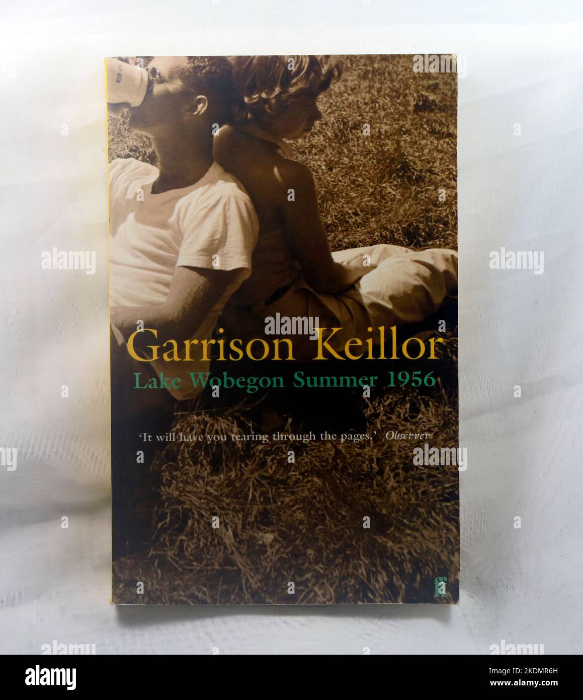 Garrison Keillor, Lake Wobegon Summer 1956. Paperback Book cover. Studio set up. Taken November 2022. Faber and Faber. Stock Photo