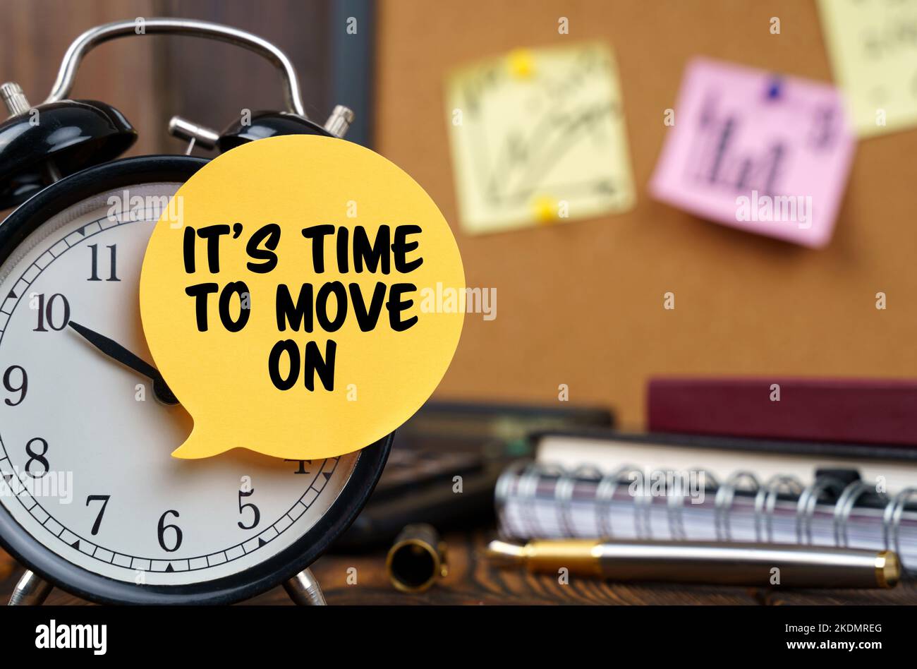 Business concept. The alarm clocks have a sticker with the inscription It's Time to Move On