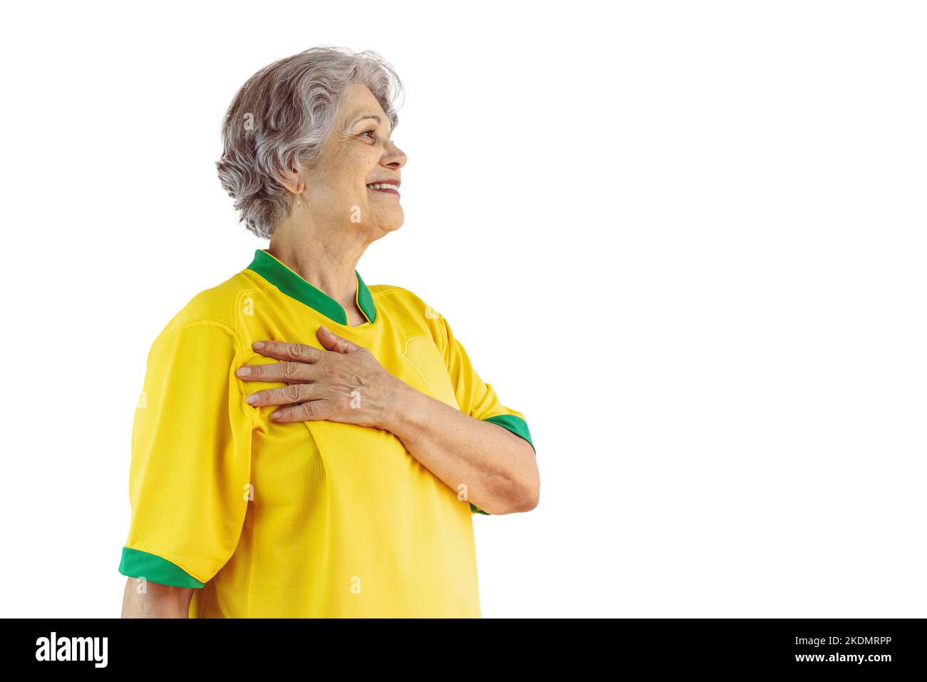 Mature Woman with Soccer Team Yellow Shirt Isolated on White. Sport Fan With Flag Celebrating the Cup. Stock Photo
