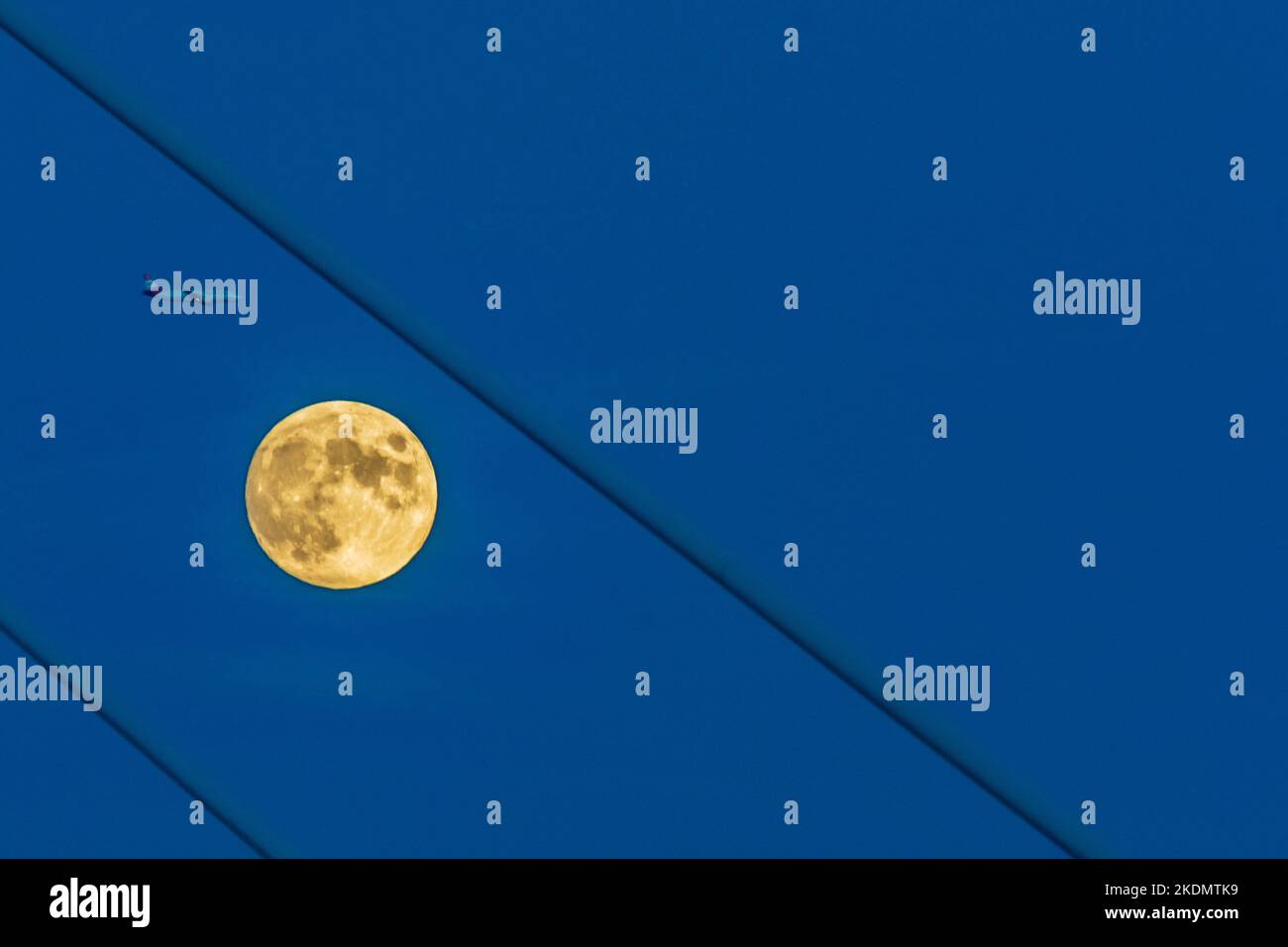 Wien, Vienna: full moon and plane, ropes of a bridge in , Wien, Austria ...